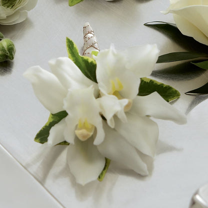 White Mini Cymbidium Boutonniere – DANDELIONS ALL THINGS WEDDINGS & EVENTS, Germanton NC